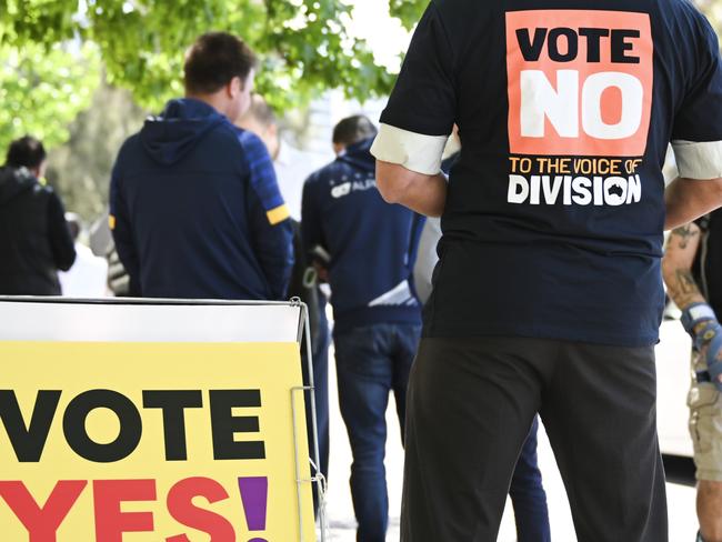 CANBERRA, AUSTRALIA - OCTOBER 13: "Vote No" volunteers at a polling centre on October 13, 2023 in Canberra, Australia. A referendum for Australians to decide on an indigenous voice to parliament will be held on October 14, 2023 and compels all Australians to vote by law. Early voting began on Oct. 2, with voting getting underway in all states. (Photo by Martin Ollman/Getty Images)