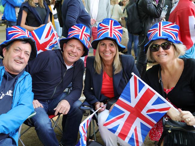 Members of the public soak up the atmosphere ahead of the Trooping the Colour parade. Picture: Getty Images