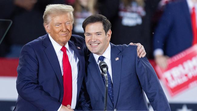 US president-elect Donald Trump with Senator Marco Rubio who is expected to be named as secretary of state. Picture: AFP