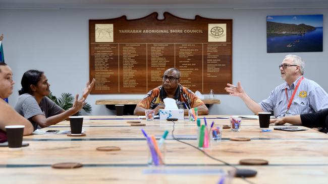 Joanne Fourmile pleads with Yarrabah Shire Council CEO Richard Wright to reassess her family’s position on the council’s housing register. Picture: Isaac McCarthy