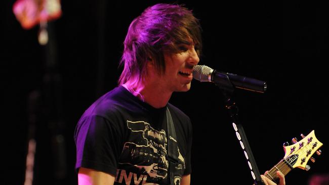 Frontman hair: All Time Low lead singer Alex Gaskarth performs in 2009. Picture: Getty Images