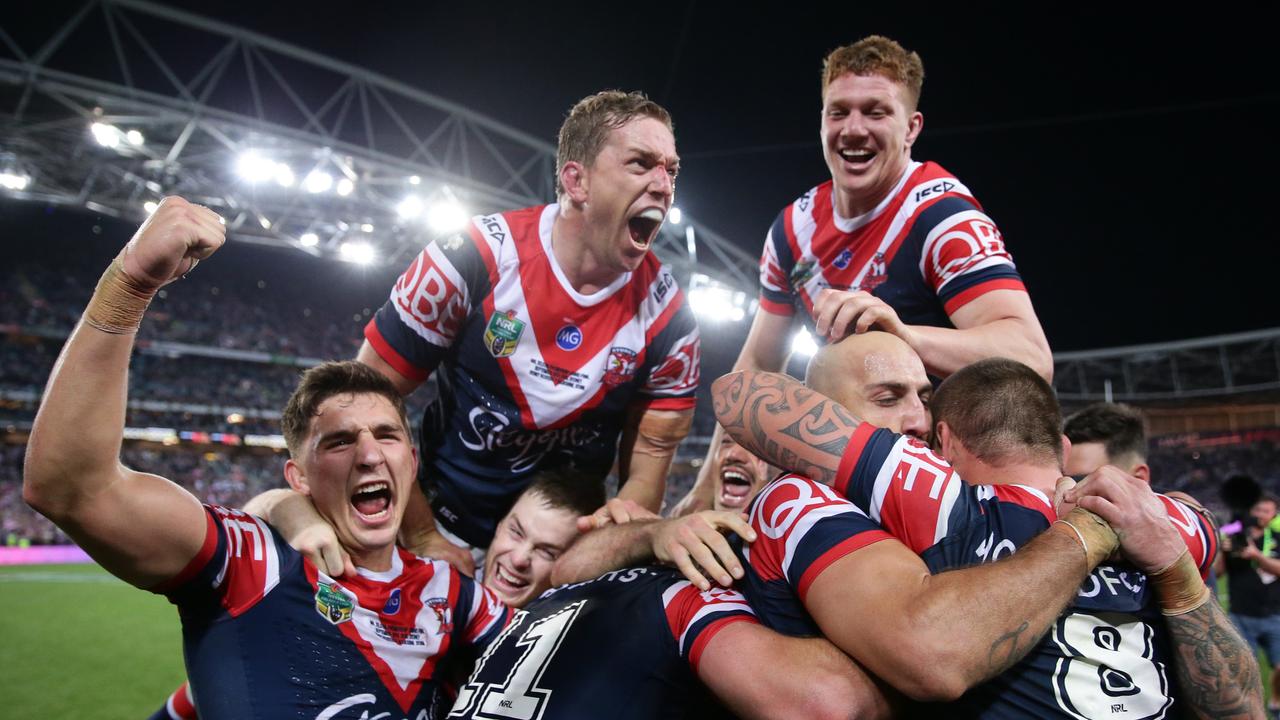 Roosters players celebrate. Picture: Brett Costello