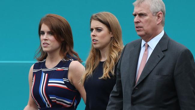 Princess Eugenie, Princess Beatrice of York and Prince Andrew. Picture: Justin Tallis/AFP