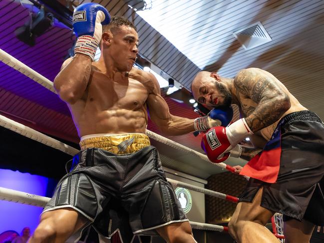 David Nyika (left) fights Waikato Falefehi. Picture: Darren Burns