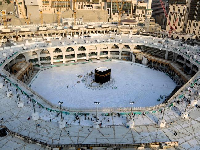 An aerial view of the white-tiled area surrounding the Kaaba, inside Mecca’s Grand Mosque, which is empty of worshippers. Picture: Abdel Ghani Bashir/AFP