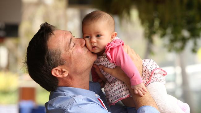 Adam Brand with daughter, Pepper Nicha Brand. Picture Glenn Hampson