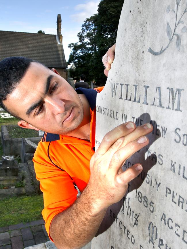 Stonemason Pierre Ayoub at the grave in Canterbury. Picture: