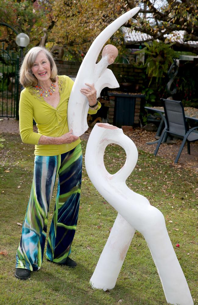 St Ives Sculptor Helen Leete made the iconic sculpture at Fairy Bower Rock pool that was damaged in the storm. She's working on a replacement. Pictured with her work in progress. Photo: Adam Ward