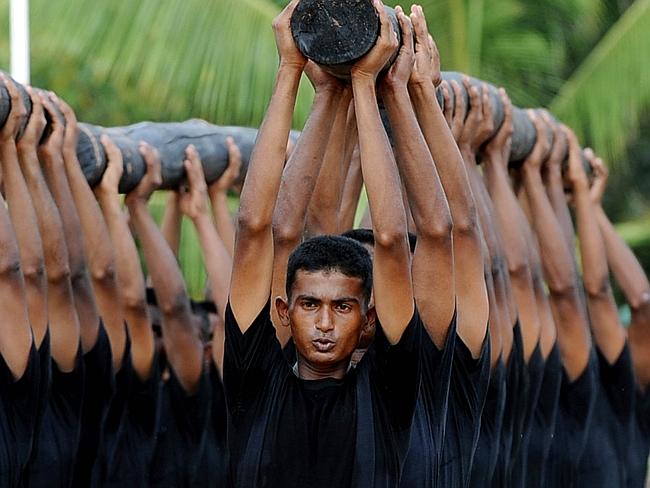 Elite commandos from the Sri Lanka Police Special Task Force who battled against the Tamil Tigers. They are pictured during a parade in 2008. AFP PHOTO/Ishara S. Kodikara