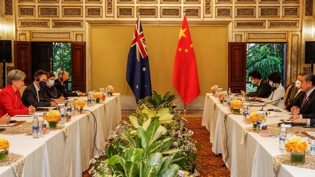 Penny Wong (L) speaks with China's Foreign Minister Wang Yi (R) during their bilateral meeting. Picture: AFP.