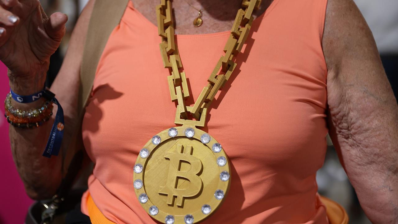 An attendee wears a necklace at the Bitcoin 2021 Convention. Picture: Joe Raedle/Getty Images/AFP