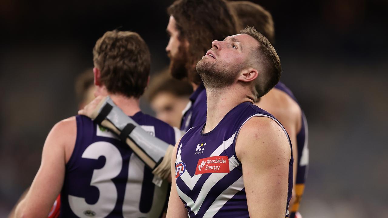 PERTH, AUSTRALIA - AUGUST 25: Luke Ryan of the Dockers reacts after being defeated during the round 24 AFL match between Fremantle Dockers and Port Adelaide Power at Optus Stadium, on August 25, 2024, in Perth, Australia. (Photo by Paul Kane/Getty Images)