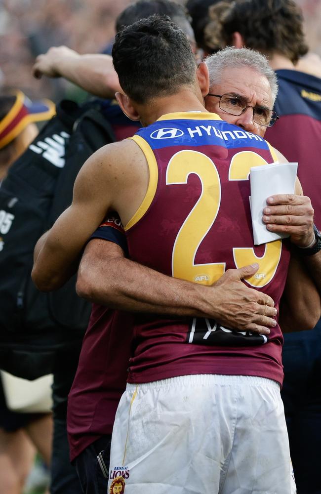 Charlie Cameron and Chris Fagan embrace after the final siren after the 2023 GF. Picture: Russell Freeman/AFL Photos via Getty Images