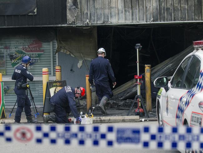 BRISBANE, AUSTRALIA. NewsWire Photos. MAY 30, 2025. Police and Fire Investigators at a Browns Plains Tobacconists as Two men were  seriously injured after a tobacco shop  was set alight in what police say is a suspicious fire.Picture: NewsWire/ Glenn Campbell
