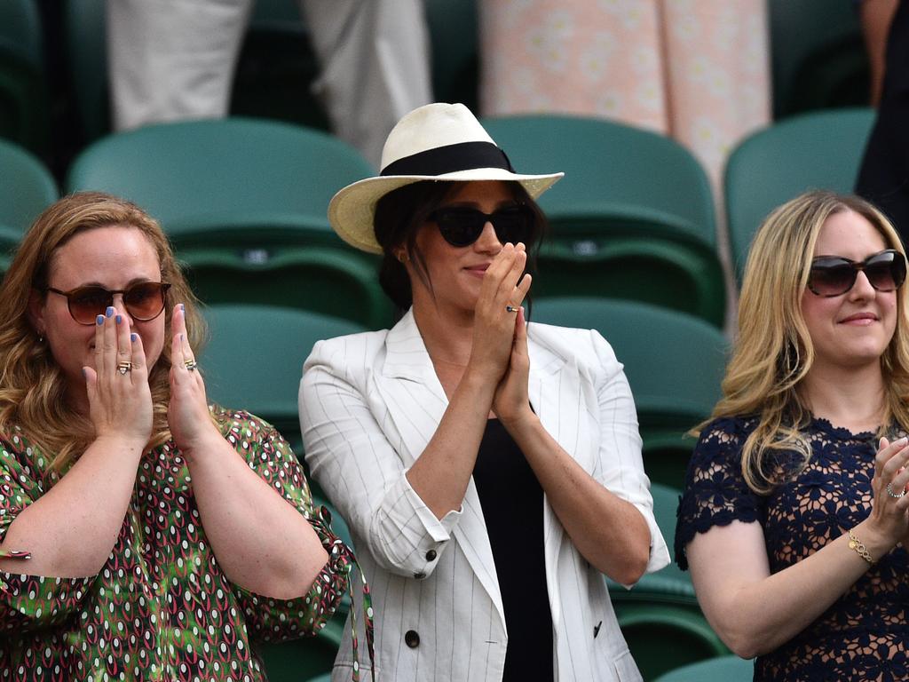 Meghan and her mates at Wimbledon. Picture: Glyn KIRK / AFP
