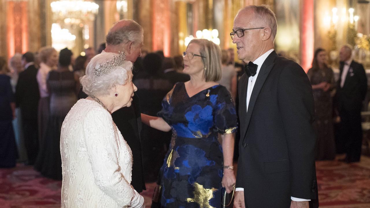 Queen Elizabeth II greets Malcolm Turnbull and his wife Lucy Turnbull at Buckingham Palace in 2018. Picture: Victoria Jones - WPA Pool/Getty Images