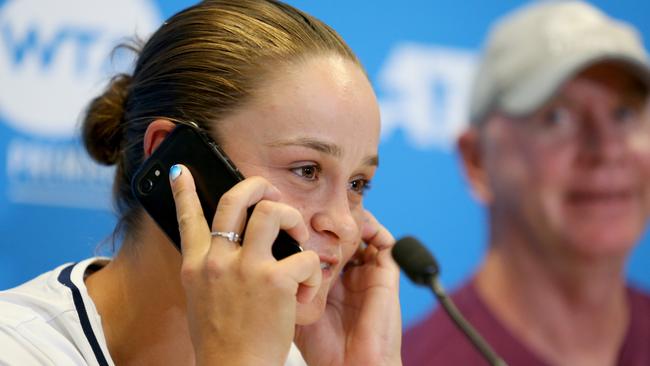 Ash Barty answers the call from Kerryn Harrington. Picture: AAP Images