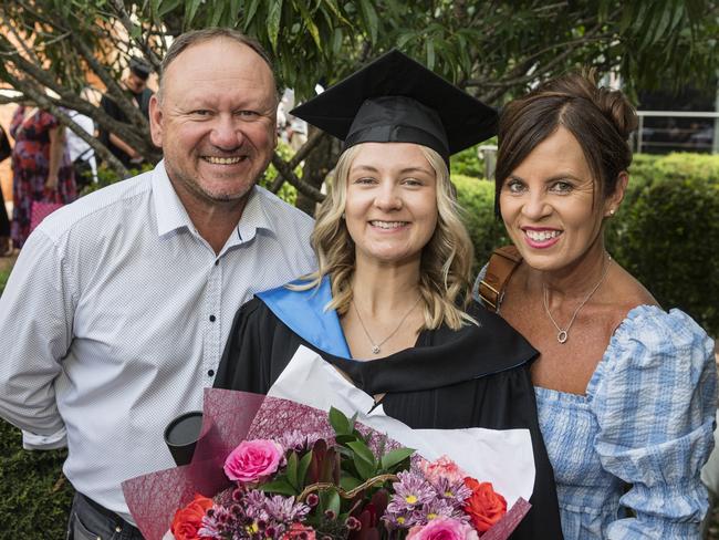 Bachelor of Nursing graduate Taylah Herring with Chris and Shannon Webster at a UniSQ graduation ceremony at Empire Theatres, Tuesday, February 13, 2024. Picture: Kevin Farmer