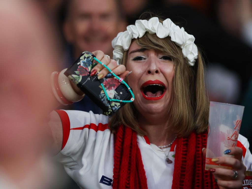 An England fan celebrates after a try during the Rugby League World Cup Semi-Final match between England and Samoa. Picture: Matthew Lewis/Getty Images for RLWC