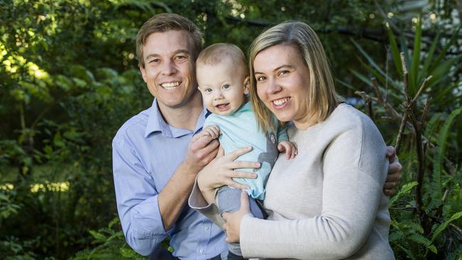 Cr Julian Simmonds celebrates his preselection as the LNP candidate for Ryan with wife Madeline and baby son Theodore. Picture: AAP/Renae Droop