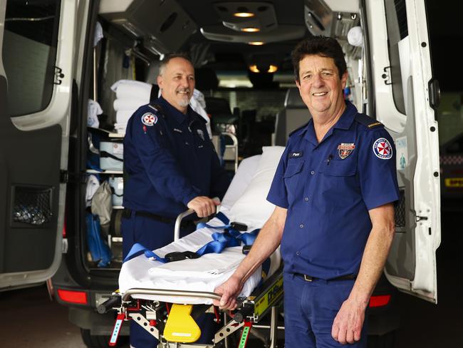 Paramedics Andrew Edwards, pictured left, and Pete Hogan, right, at Penrith ambulance station. Picture: Justin Lloyd