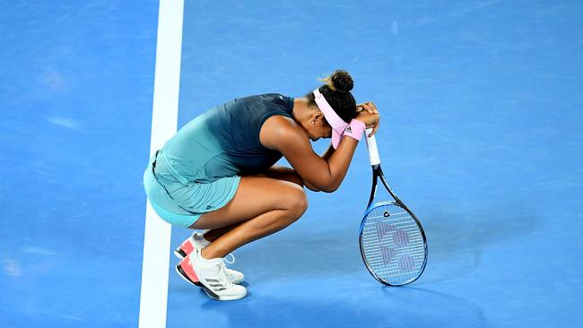 MELBOURNE, AUSTRALIA - JANUARY 26: Naomi Osaka of Japan celebrates after winning championship point in her Women's Singles Final match against Petra Kvitova of Czech Republic during day 13 of the 2019 Australian Open at Melbourne Park on January 26, 2019 in Melbourne, Australia. (Photo by Quinn Rooney/Getty Images)