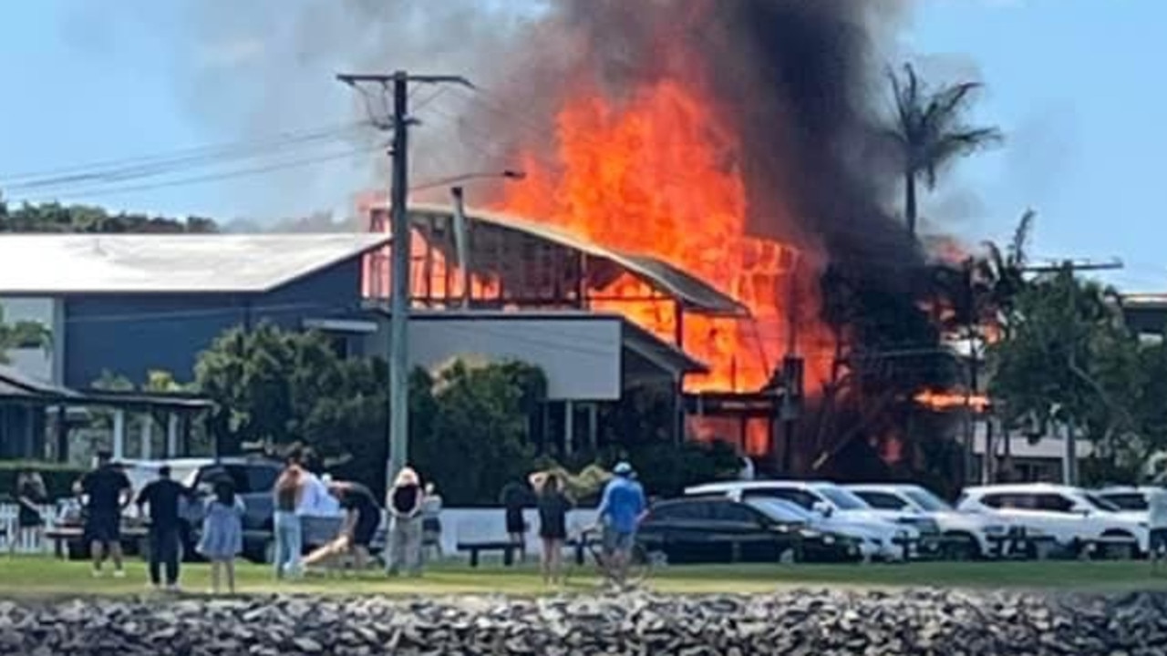 Luxury waterfront home engulfed by wall of fire