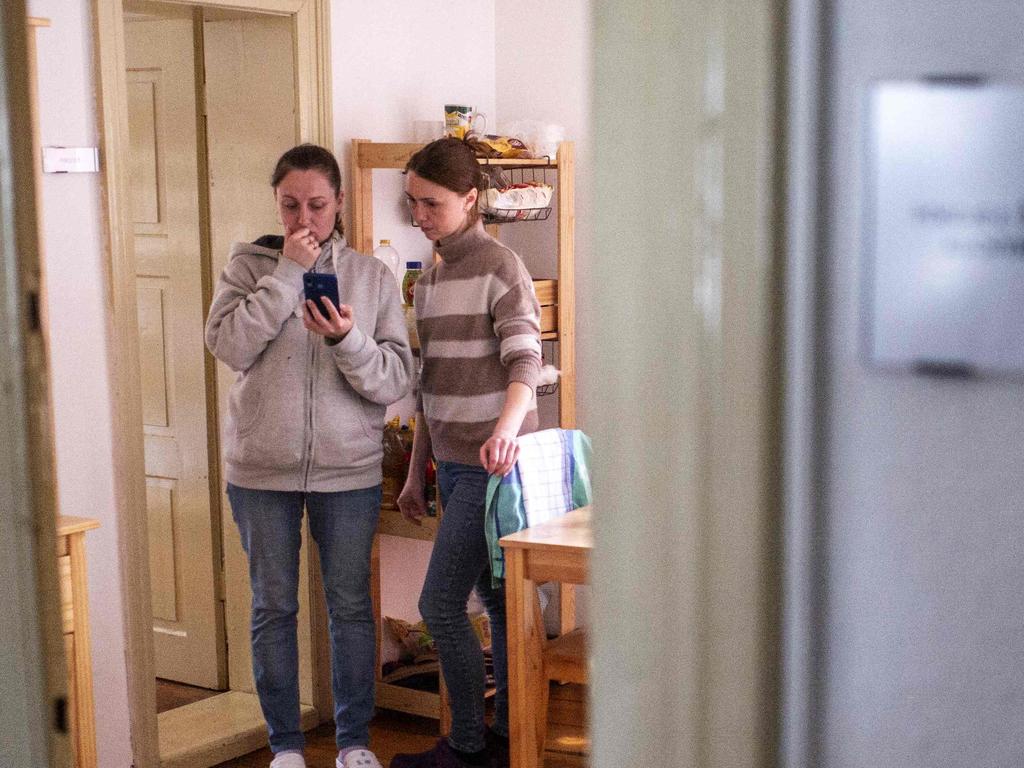 Olga (L) and another woman who fled Ukraine in their small flat at the Becov nad Teplou castle. Picture: Michal Cizek/AFP