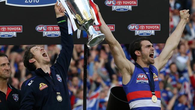 2016 AFL Grand Final match between the Western Bulldogs and the Sydney Swans at the Melbourne Cricket Ground (MCG), Melbourne, Australia on October 1, 2016. Bob Murphy & Easton Wood with Luke Beveridge &Picture :Wayne Ludbey