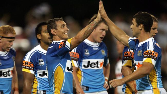 Mat Rogers scored a try and was congratulated by Richie Mathers.
