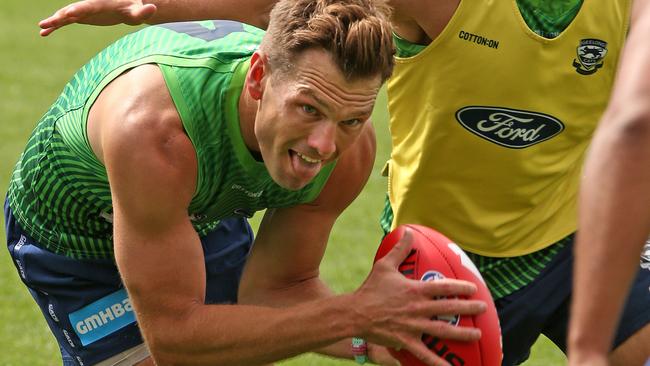 Former Roo Shaun Higgins gives the Cats a new look in the middle. Picture: Alison Wynd