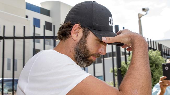 Former Australian Olympic swimmer Grant Hackett leaves Southport watchhouse after being arrested at his parent’s home. Photo: Jerad Williams