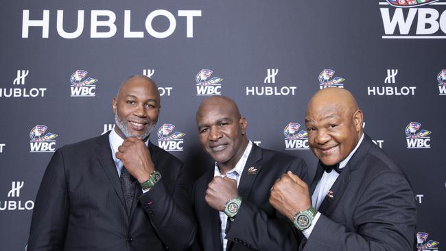 Lennox Lewis (left), Evander Holyfield (centre) and George Forman (right), attend the Hublot Night of Champions Gala. Photo by Omar Vega/HUBLOT via Getty Images.