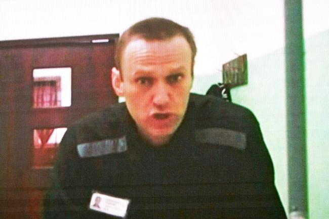 Navalny is seen on a screen via a video link from his penal colony during court hearings on June 22, 2023