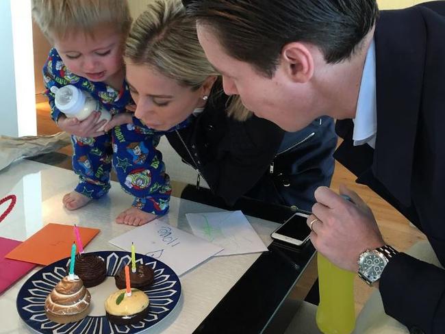 Roxy gets a little help from son Hunter and husband Oliver Curtis to blow out her candles.