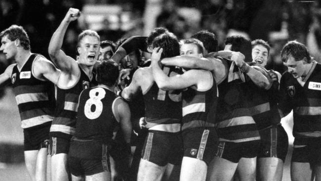 Rod Jameson is swamped by Adelaide teammates having kicked the winning goal after the siren against Fitzroy in 1991 at Football Park. Picture: Chris Mangan.