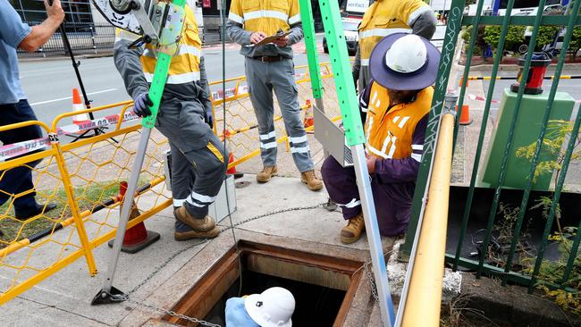 Energex works to fix the power at the Gabba. Picture: David Clark