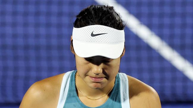 DUBAI, UNITED ARAB EMIRATES - FEBRUARY 18: Emma Raducanu of Great Britain reacts while playing against Karolina Muchova of the Czech Republic in their second round match during day three of the Dubai Duty Free Tennis Championships, part of the Hologic WTA Tour at Dubai Duty Free Tennis Stadium on February 18, 2025 in Dubai, United Arab Emirates. (Photo by Christopher Pike/Getty Images)