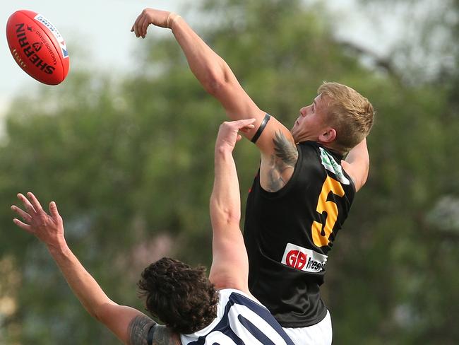 Ballarat FL footy: Melton South v Bacchus Marsh: Daniel Burton (top) of Bacchus Marsh contests ruck against Marc Dransman of Melton SouthSaturday, May 1, 2021, in Melton, Victoria, Australia. Picture: Hamish Blair