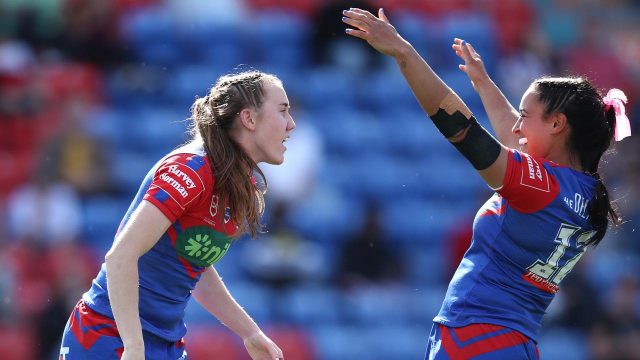 NEWCASTLE, AUSTRALIA - SEPTEMBER 09: Tamika Upton of the Knights celebrates scoring a try with Yasmin Clydsdale of the Knights during the round eight NRLW match between Newcastle Knights and Sydney Roosters at McDonald Jones Stadium on September 09, 2023 in Newcastle, Australia. (Photo by Jason McCawley/Getty Images)