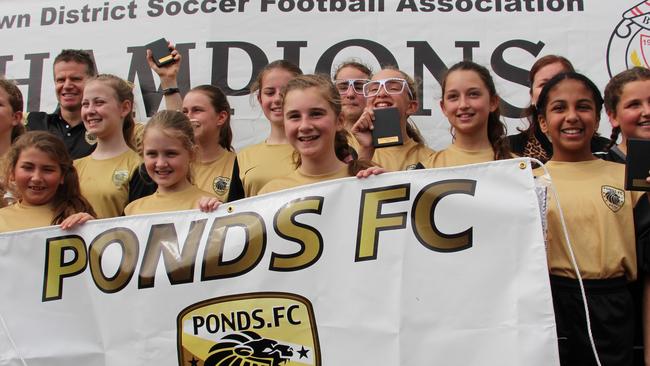 The Ponds FC under 12 girls team which won the 2014 competition.