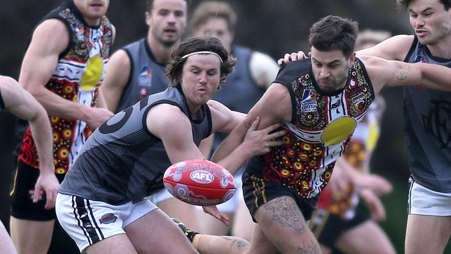 Cooper Gaffney (left) was a standout at the back for Port District. Picture: Dean Martin