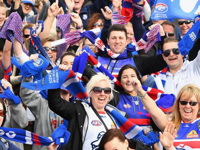 MELBOURNE, AUSTRALIA - OCTOBER 02: Bulldogs fan queue to get into the Whitten Oval during the Western Bulldogs AFL Grand Final celebrations at Whitten Oval on October 2, 2016 in Melbourne, Australia. The Western Bulldogs defeated the Sydney Swans in yesterday's AFL Grand Final. (Photo by Quinn Rooney/Getty Images)