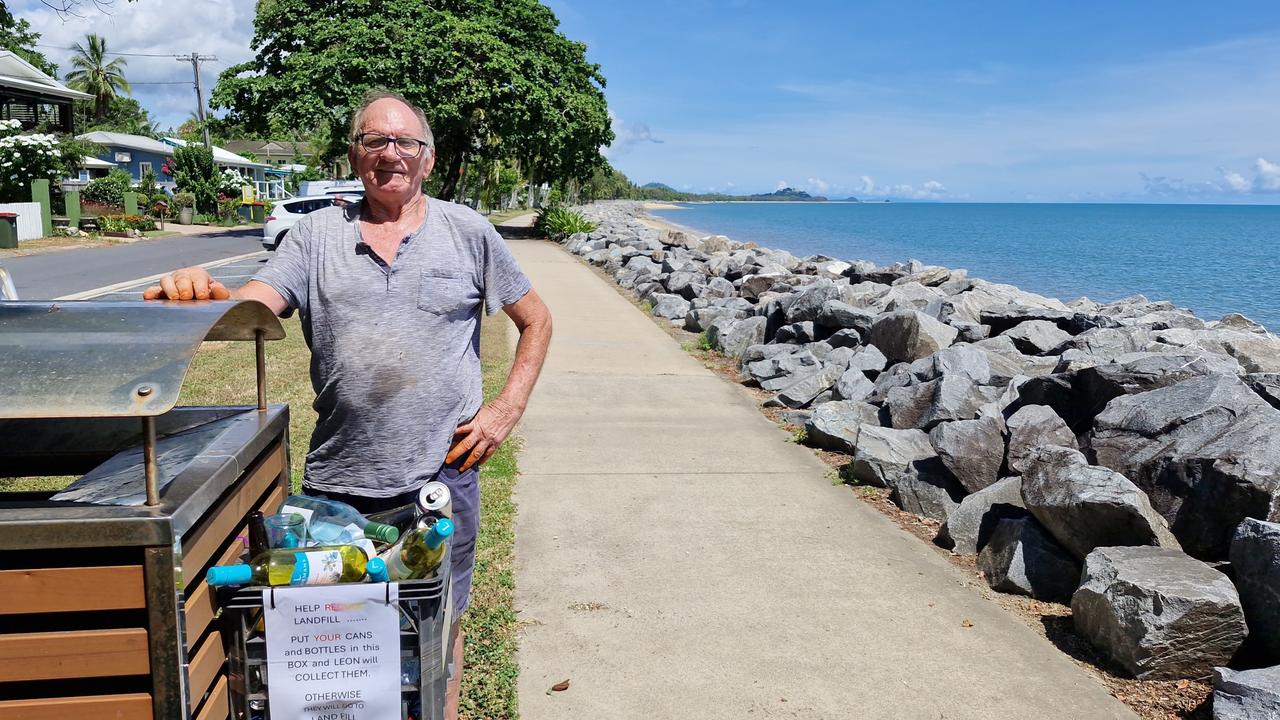 Machans Beach resident Leon Bradley is helping to divert recyclable bottles and cans from landfill by attaching special baskets to public garbage bins. Picture: Supplied