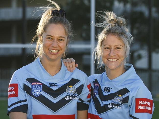 Kezie Apps and Talisha Quinn in their Blues uniform.