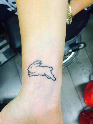 South Sydney Rabbitohs fans get tattoos to celebrate 2014 Grand Final ...