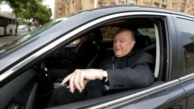 Archbishop Philip Wilson leaves the Catholic Archdiocese of Adelaide after being charged on Tuesday. Picture: Kelly Barnes