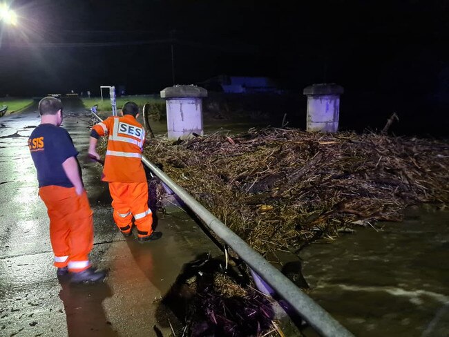 SES volunteers view the debris on the bridge. Picture: NSW SES Inverell Unit