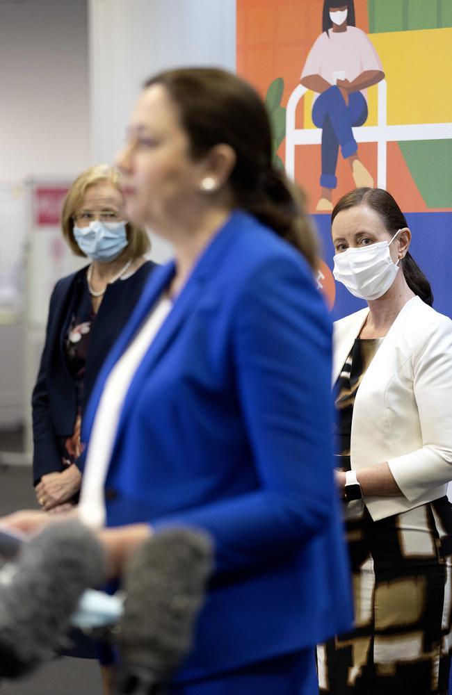 Chief Health Officer Jeannette Young and Queensland Health Minister Yvette D'Ath look on as Queensland Premier Annastacia Palaszczuk speaks to the media. Picture: NCA NewsWire / Sarah Marshall