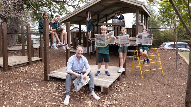 Bryce Corbett - who has started Newshounds - with Canon Hill State School students, who are learning about media literacy. Picture: David Kelly